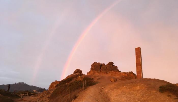 Gingerbread monolith with a rainbow.