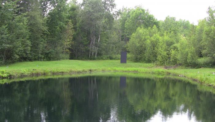 Center Across Pond Monolith