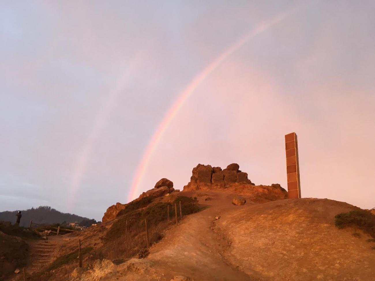 Gingerbread monolith with a rainbow.