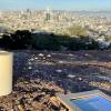 A solemn candle and a photograph where the monolith once stood.  Photo: Sergio Quintana / @svqjournalist, NBC News