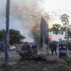  Residents set fire to the mysterious monolith that appeared in Kinshasa, Democratic Republic of Congo February 17, 2021. REUTERS/Kenni Katombe